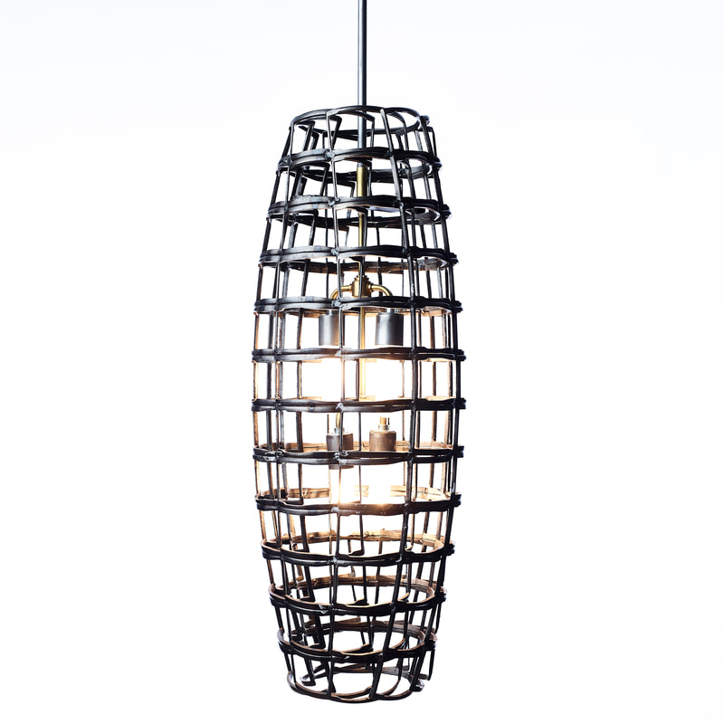 Lucy Slivinski Interior Lighting "Maize"
recycled steel objects
32.25"H X 12.25" D